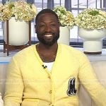 Dwyane Wade’s yellow cardigan with M patch on Today