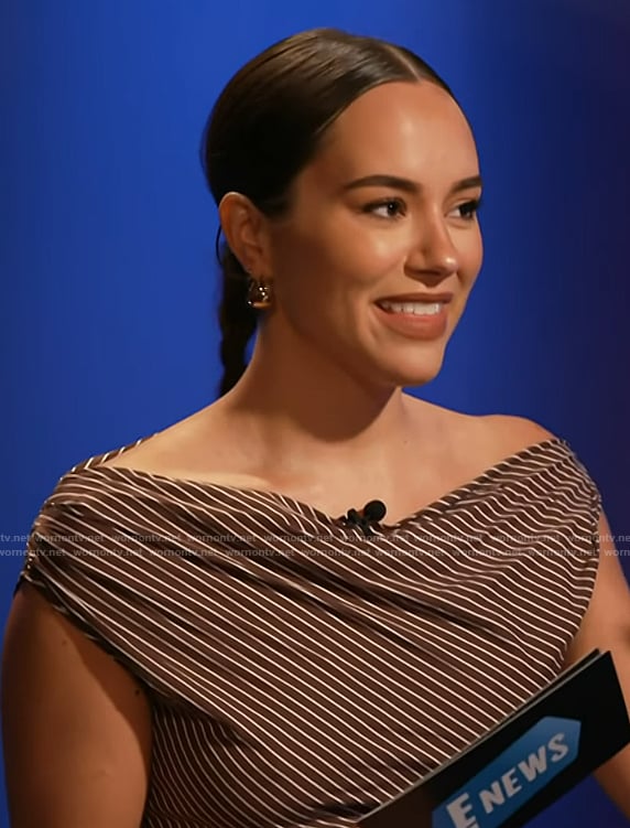 Emily Curl’s brown stripe asymmetric shoulder dress on E! News