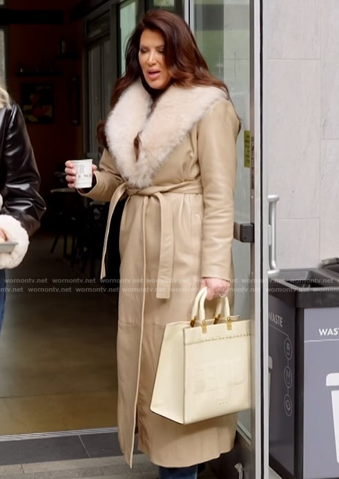 Emily's beige leather shearling coat on The Real Housewives of Orange County