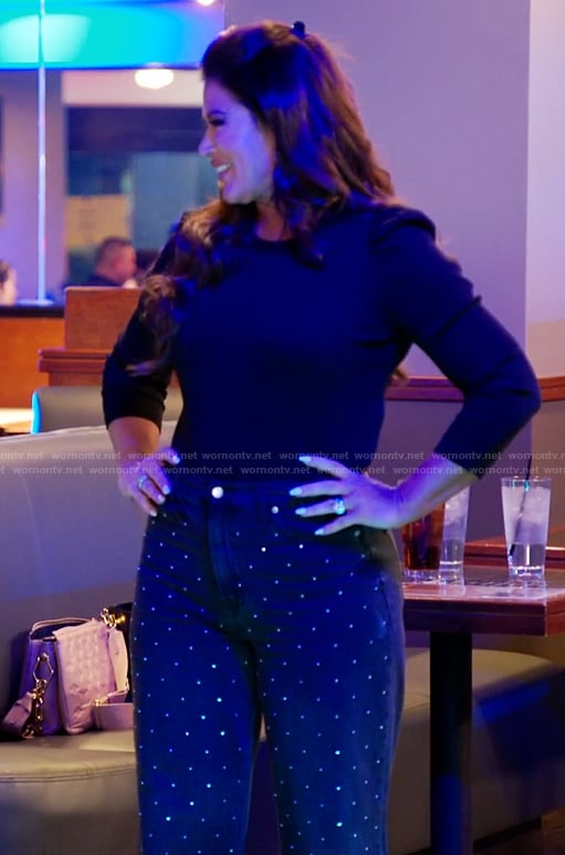 Emily’s black puff sleeve top and embellished jeans on The Real Housewives of Orange County