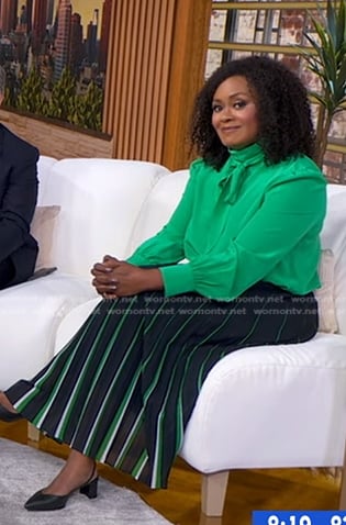 Ericka Sóuter’s navy stripe pleated skirt on Good Morning America