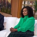 Ericka Sóuter’s navy stripe pleated skirt on Good Morning America