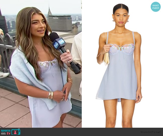 Gia Giudice’s blue lace tie front dress on E! News