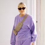 Gina’s purple sweatshirt and sweatpants on The Real Housewives of Orange County