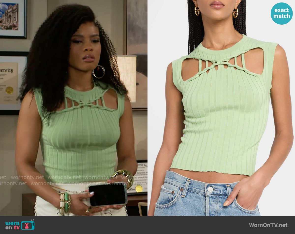Eva’s green cutout top on Beyond the Gates