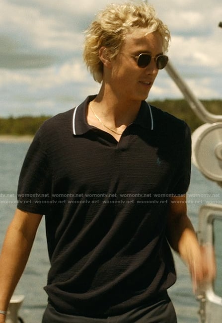 Johnny's navy contrast polo on We Were Liars