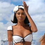 Kiki’swhite contrast trim bikini on The Real Housewives of Miami