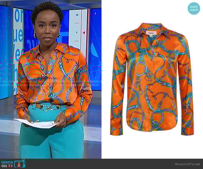L'Agence Tyler Silk Blouse in Orange/Teal Buckle Chain worn by Zinhle Essamuah on NBC News Daily
