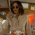 Lisa’s beige ruffle shoulder top on And Just Like That