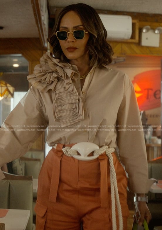 Lisa's beige ruffle shoulder top on And Just Like That