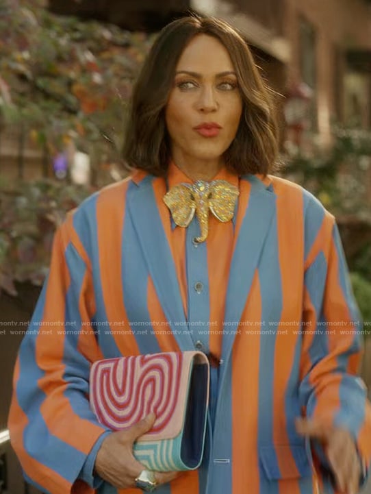 Lisa's multicolored quilt clutch bag on And Just Like That