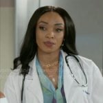 Madison’s blue floral tie-neck blouse on Beyond the Gates