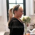 Marysol’s black logo print hoodie and headband on The Real Housewives of Miami