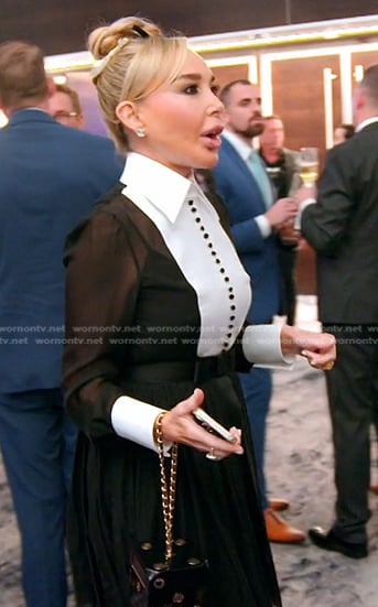 Marysol's black pleated bib collar dress on The Real Housewives of Miami