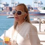 Marysol’s white scalloped cardigan and shorts on The Real Housewives of Miami