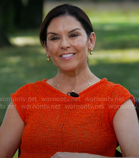 Meg Oliver’s red textured knit top on CBS Mornings
