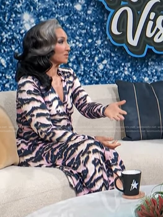 Michelle Visage’s tiger stripe print wrap dress on Access Hollywood