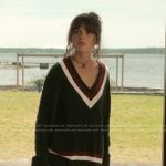 Candence’s navy oversized varsity sweater on We Were Liars