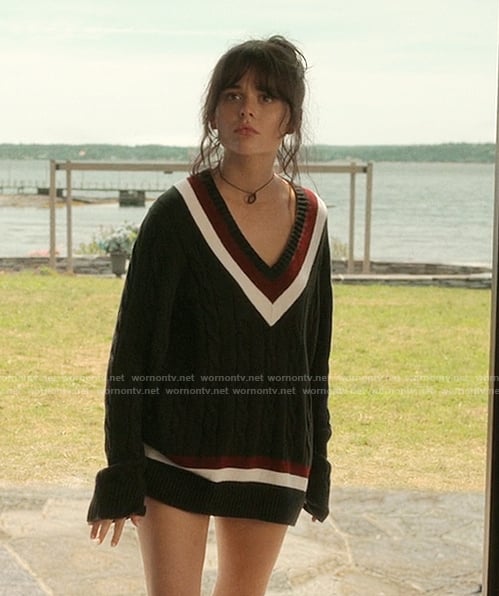 Candence’s navy oversized varsity sweater on We Were Liars