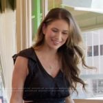 Nia’s black v-neck ruffle dress on The Valley