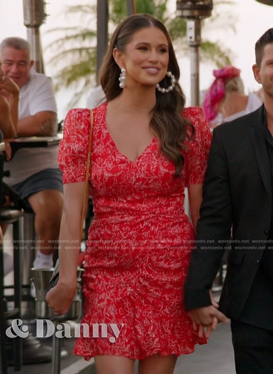 Nia's red floral print mini dress on The Valley