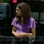 Nicole Sganga’s purple knit top on CBS Mornings
