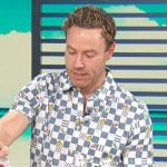 Paul Zhan’s checkerboard print shirt on Access Hollywood