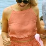 Penny’s coral crop top and skirt on We Were Liars