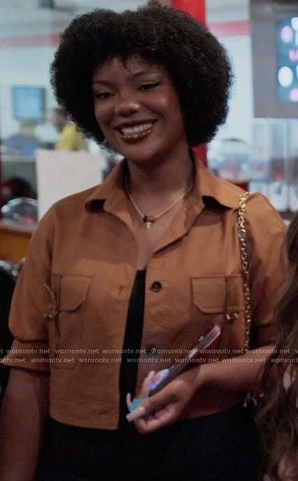Riley's brown shirt on Next Gen NYC