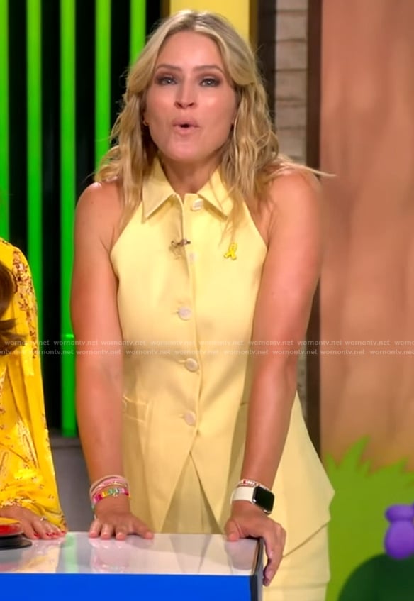 Sara's yellow button vest and pants on The View