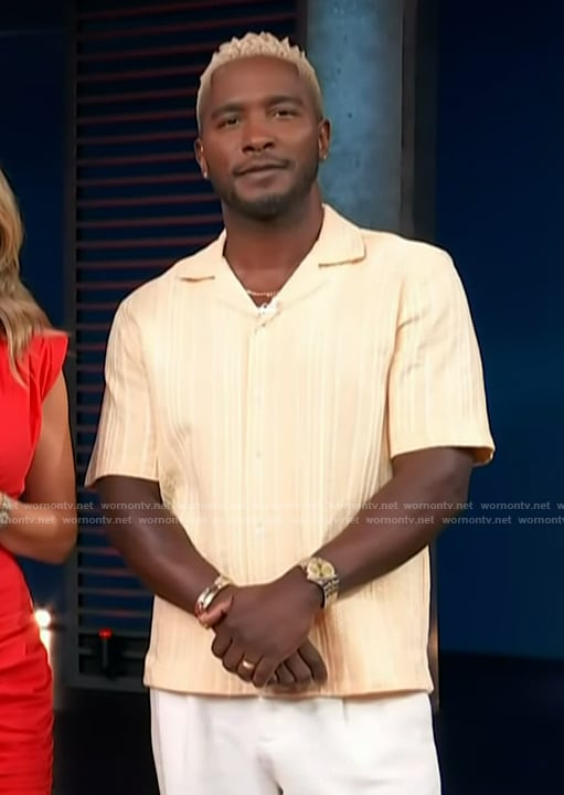 Scott’s yellow knit shirt on Access Hollywood