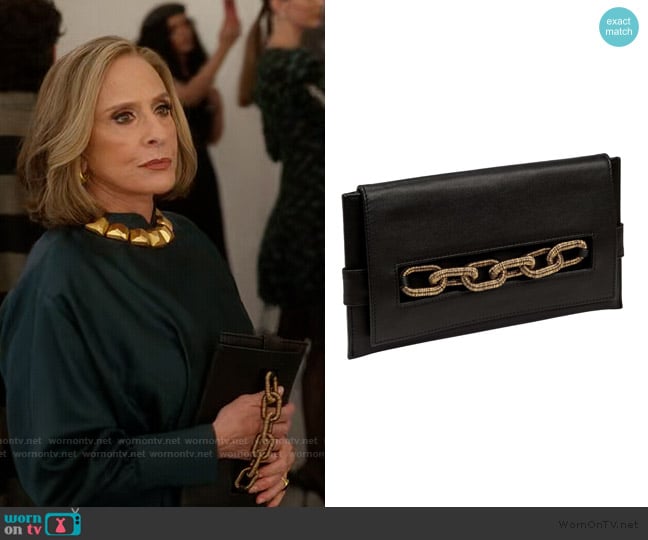 Serena Uziyel Catena Black and Gold Envelope Gusset Clutch worn by Gia (Patti LuPone) on And Just Like That
