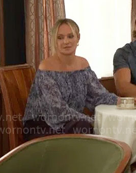 Sharon's blue floral off-shoulder blouse on The Young and the Restless