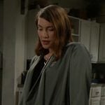 Steffy's black ring keyhole top and green satin jacket on The Bold and the Beautiful