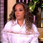 Sunny’s white lace ruffle blouse on The View
