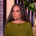 Sunny’s green knit sweater and skirt on The View