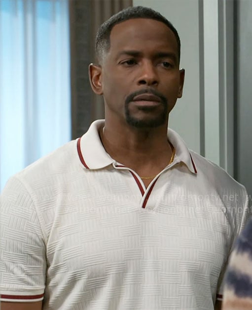 Ted's white textured polo shirt with red trims on Beyond the Gates
