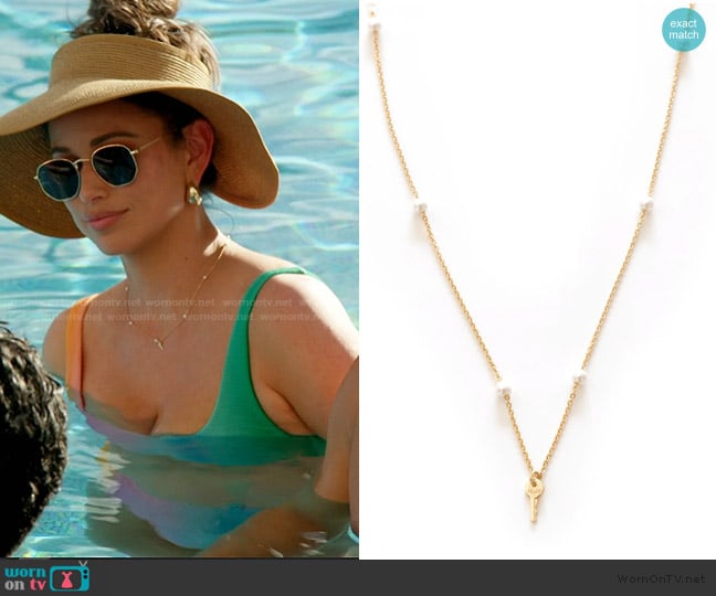 The Giving Keys Peaceful Pearl Mini Key Necklace worn by Nia Booko on The Valley