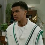 Tyrell’s sewater vest with green trims on Beyond the Gates