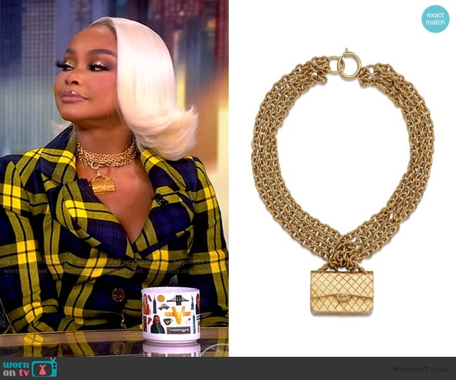 Vivienne Westwood A Gold Flap Bag Pendant worn by Phaedra Parks on The View