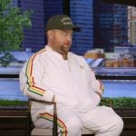 Paul Walter Hauser’s white track jacket and pants on Live with Kelly and Mark