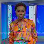 Zinhle’s orange chain print blouse and teal blue pants on NBC News Daily