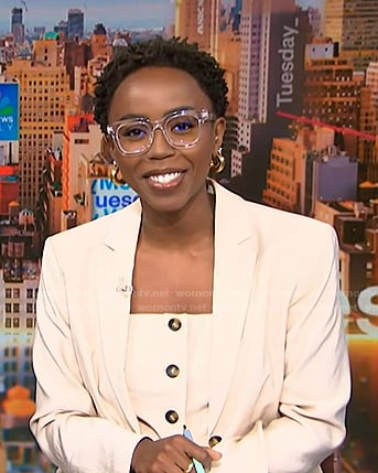 Zinhle's beige strapless vest and blazer on NBC News Daily