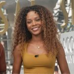 Zuri’s yellow square neck top on Access Hollywood