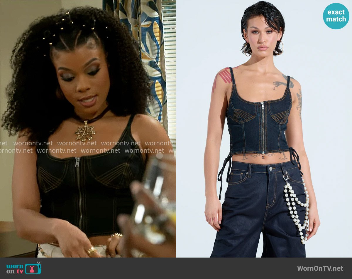 Akira Denim Corset Top worn by Eva Thomas (Ambyr Michelle) on Beyond the Gates