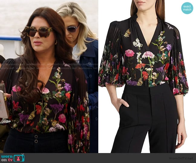 Alice + Olivia Ilan Floral Pleated Blouse worn by Emily Simpson on The Real Housewives of Orange County