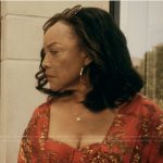 Alicia’s red printed swimsuit and coverup on The Chi