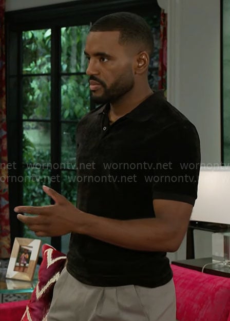 Andre’s black velvet polo shirt on Beyond the Gates