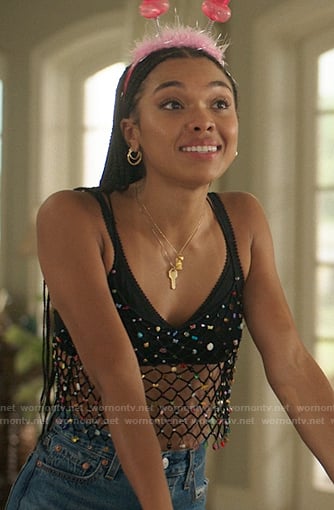 Anika’s black embellished fishnet top on The Summer I Turned Pretty