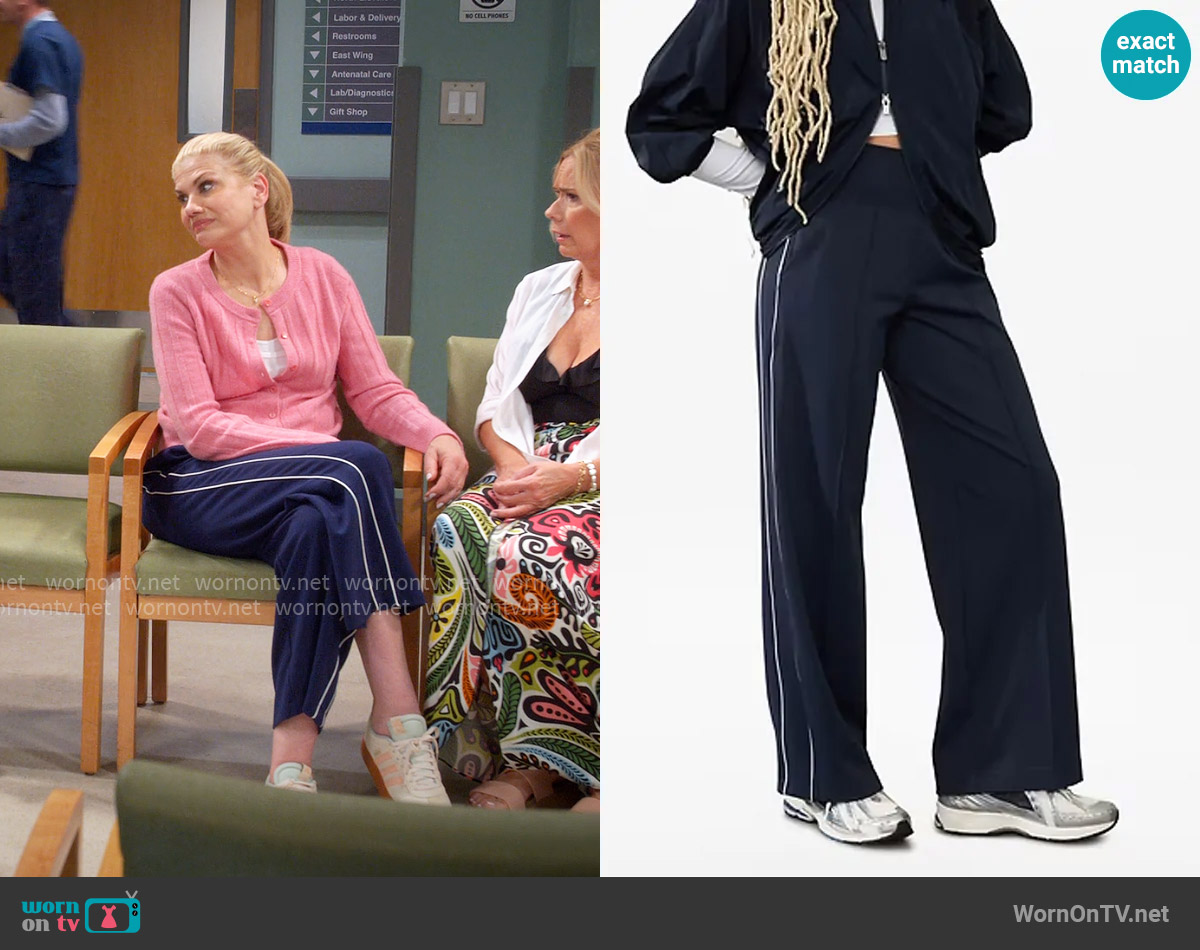 Athleta Venice High Rise Track Stripe Wide Leg Pant in Navy / Bright White worn by Carol (Kristen Johnston) on Leanne